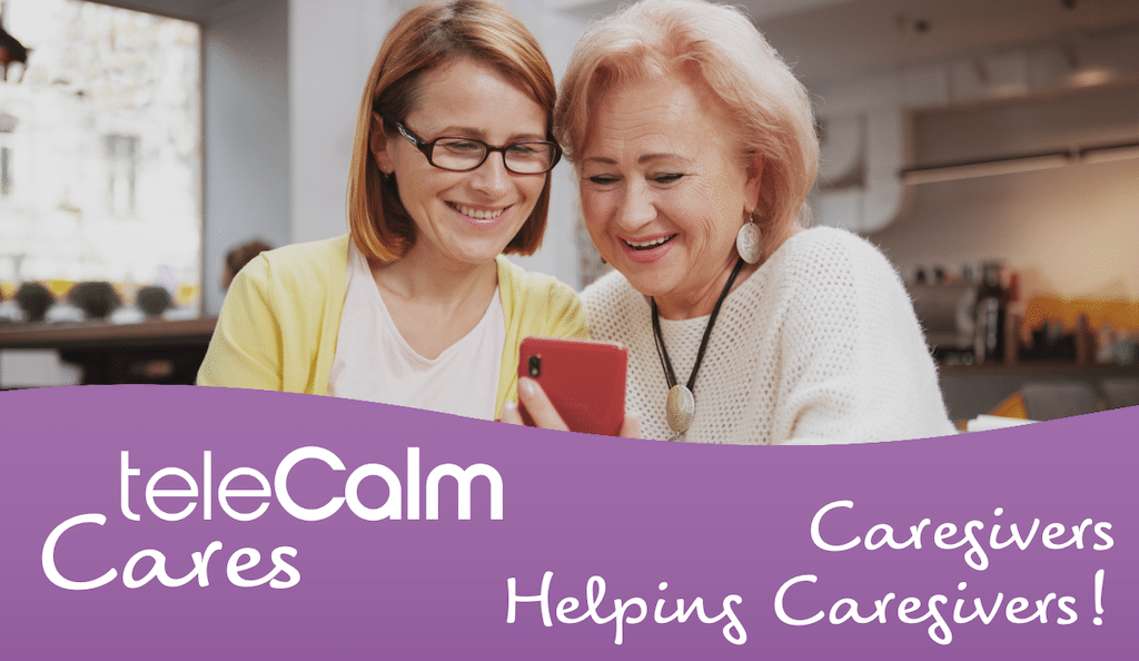 caregivers-helping-caregivers friend showing teleCalm's Caregiver app to another friend